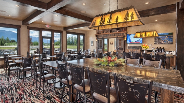 Interior, horizontal, breakfast room looking toward servery and windows with mountain view, Country Inns & Suites, Kalispell, Montana; Greg Bain & Company kalispell builder country inn dining area
