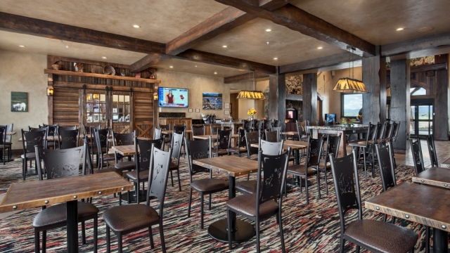 Interior, horizontal, breakfast room toward lobby and fireplace, Country Inns & Suites, Kalispell, Montana; Greg Bain & Company kalispell builder country inn dining area