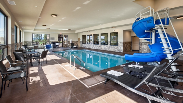 Interior, horizontal, indoor pool with waterslide, Country Inns & Suites, Kalispell, Montana; Greg Bain & Company kalispell builder country inn pool