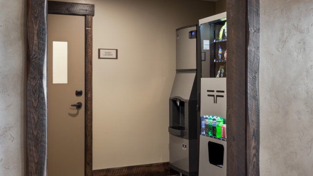 Interior, vertical, ice and vending area toward laundry room, Country Inns & Suites, Kalispell, Montana; Greg Bain & Company kalispell builder vending room